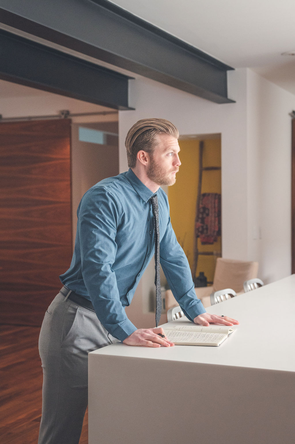 Cory Deighan working at his desk